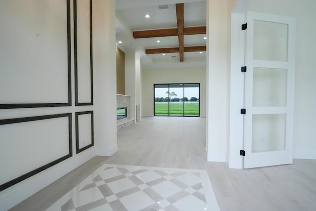 18202 Bridle Way, Fort Pierce, FL 34987 - corridor with beamed ceiling, recessed lighting, wood finished floors, coffered ceiling, and a towering ceiling