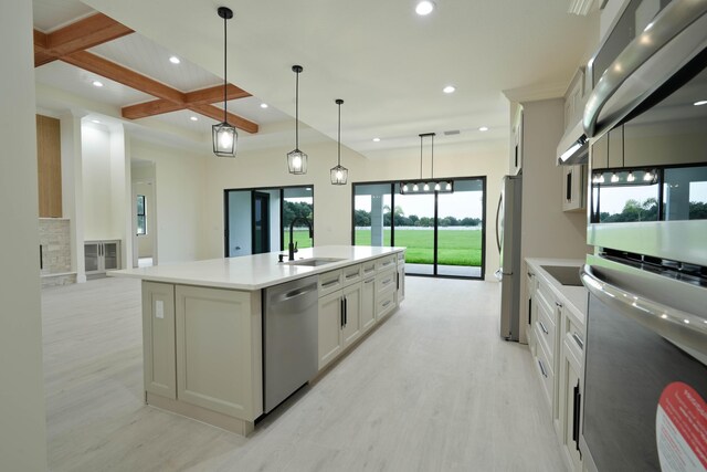 18202 Bridle Way, Fort Pierce, FL 34987 - kitchen featuring stainless steel appliances, light wood-style flooring, recessed lighting, coffered ceiling, and an island with sink