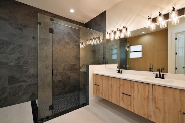 18202 Bridle Way, Fort Pierce, FL 34987 - full bathroom with a stall shower, double vanity, and recessed lighting