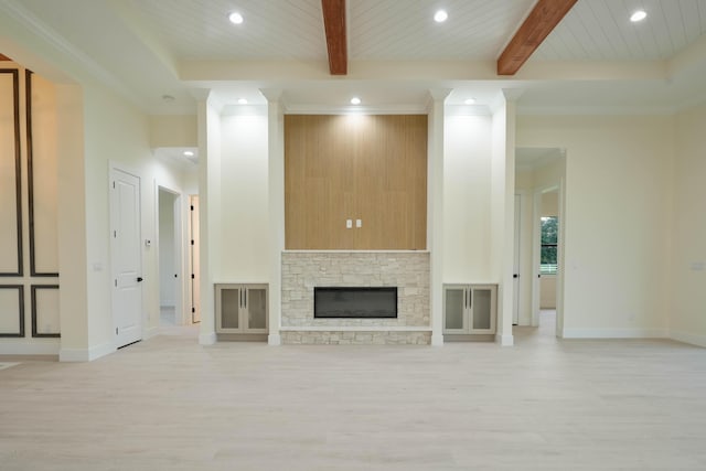 18202 Bridle Way, Fort Pierce, FL 34987 - unfurnished living room with recessed lighting, light wood-type flooring, ornamental molding, a fireplace, and a wooden ceiling with exposed beams