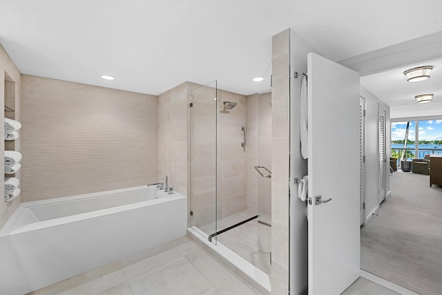 bathroom with independent shower and bath