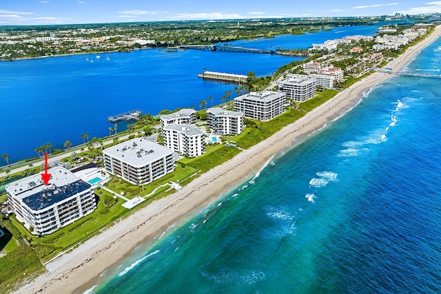 aerial view featuring a beach view and a water view