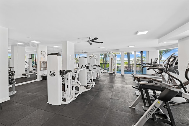 exercise room with ceiling fan