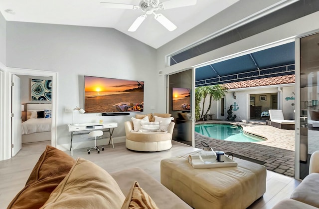 living room with vaulted ceiling and ceiling fan