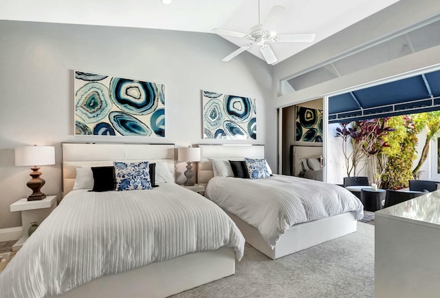 bedroom featuring vaulted ceiling, carpet flooring, access to exterior, and ceiling fan