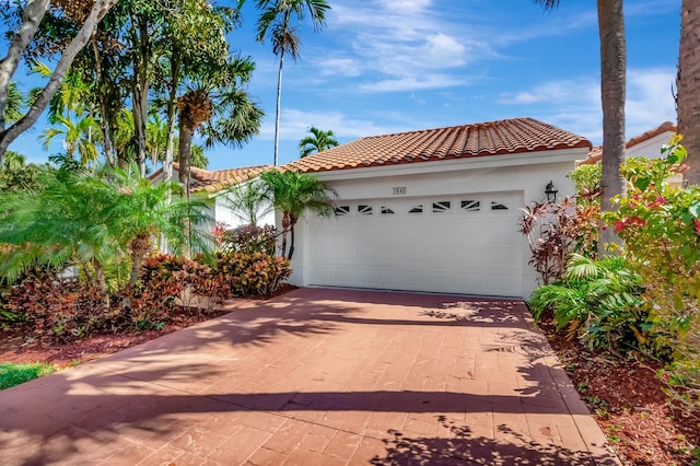 view of front of home with a garage