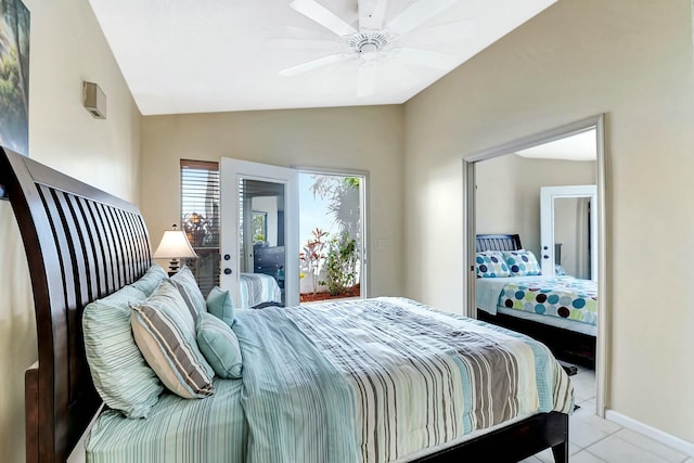 bedroom with ceiling fan, lofted ceiling, and light tile patterned floors