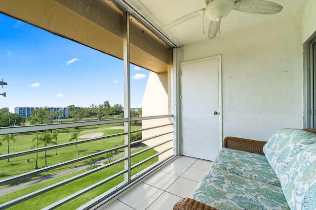 balcony featuring ceiling fan