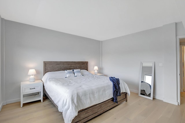 bedroom featuring light hardwood / wood-style flooring