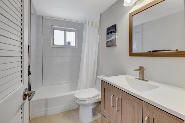 full bathroom with tile patterned flooring, vanity, shower / tub combo, and toilet