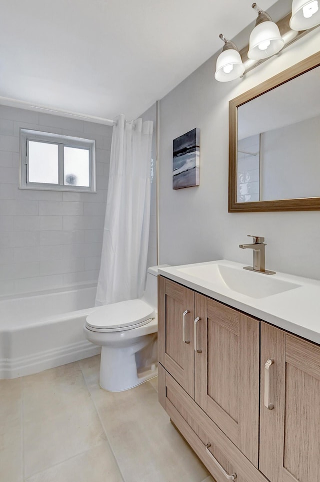 full bathroom with shower / tub combo with curtain, tile patterned floors, toilet, and vanity