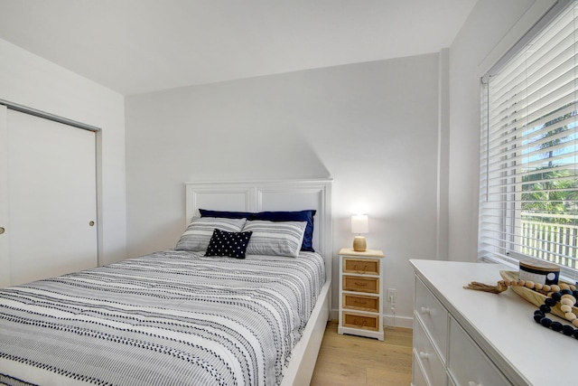 bedroom with light hardwood / wood-style flooring