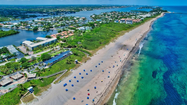 bird's eye view with a view of the beach and a water view