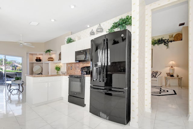 kitchen featuring white cabinetry, black appliances, kitchen peninsula, ceiling fan, and backsplash