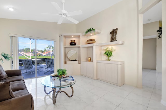 living room featuring light tile patterned floors and ceiling fan