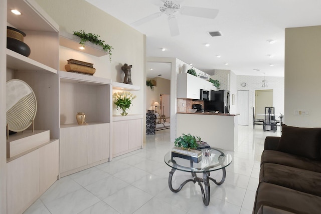 living room with ceiling fan