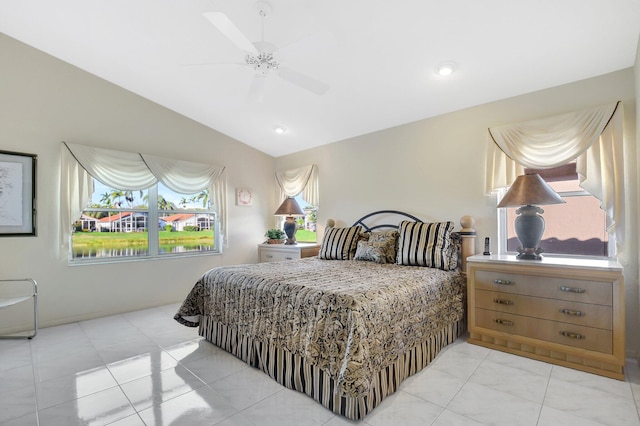 bedroom with lofted ceiling and ceiling fan