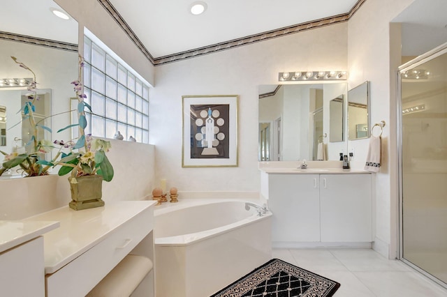 bathroom with vanity, shower with separate bathtub, and tile patterned flooring