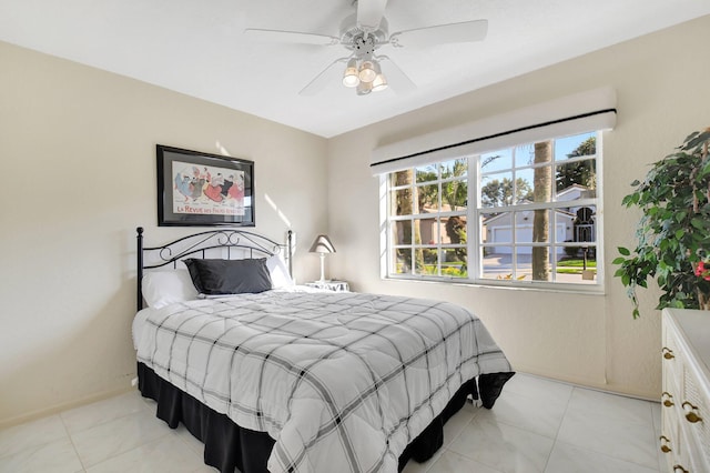 bedroom featuring ceiling fan