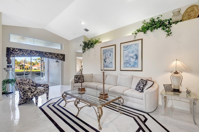 living room featuring vaulted ceiling