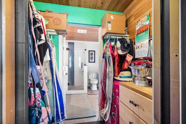 spacious closet featuring tile patterned floors