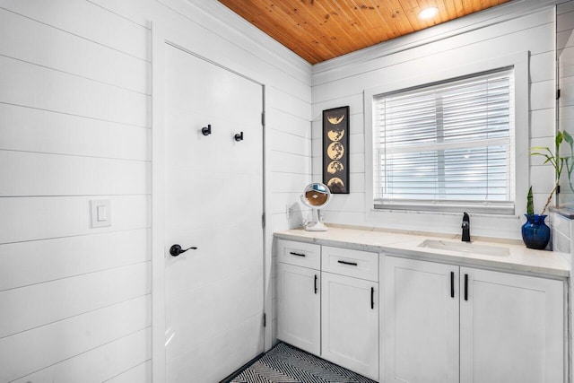 bathroom with vanity and wooden ceiling