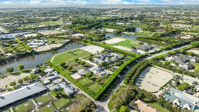 aerial view with a residential view and a water view