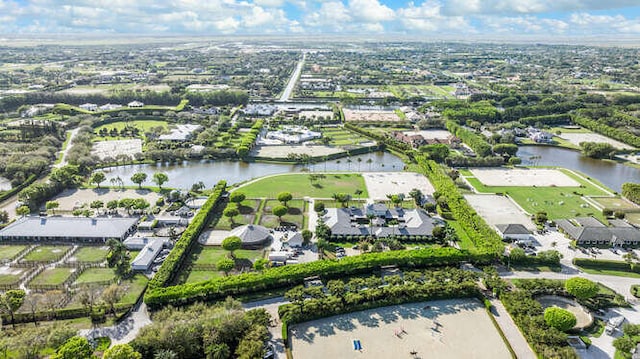 bird's eye view featuring a residential view and a water view