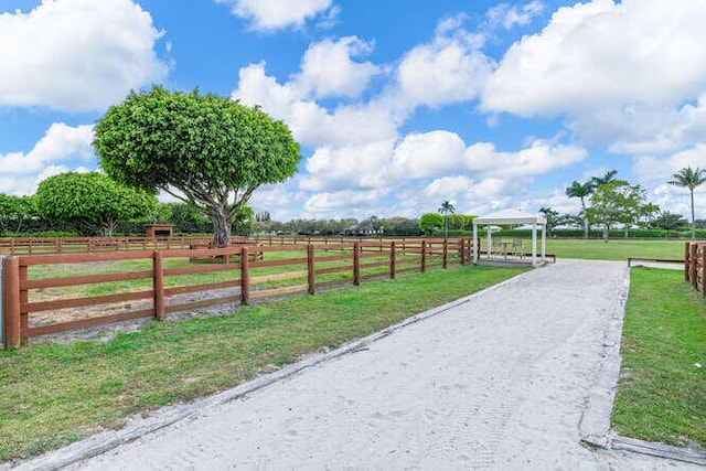 exterior space with a rural view and a gazebo