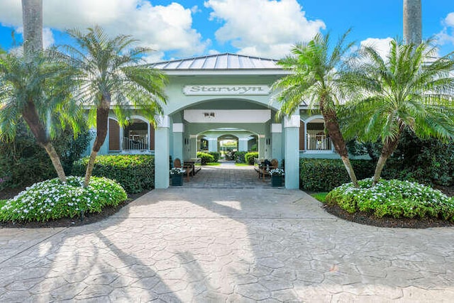 view of property's community featuring driveway