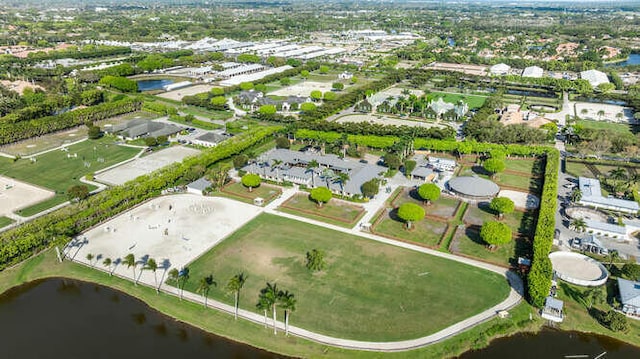 birds eye view of property featuring a residential view and a water view