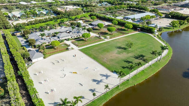 bird's eye view with a residential view and a water view