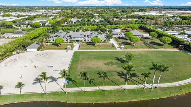 birds eye view of property featuring a residential view and a water view