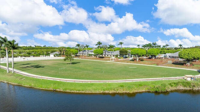 surrounding community featuring a water view