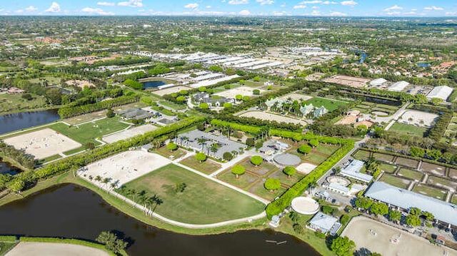 birds eye view of property with a residential view and a water view