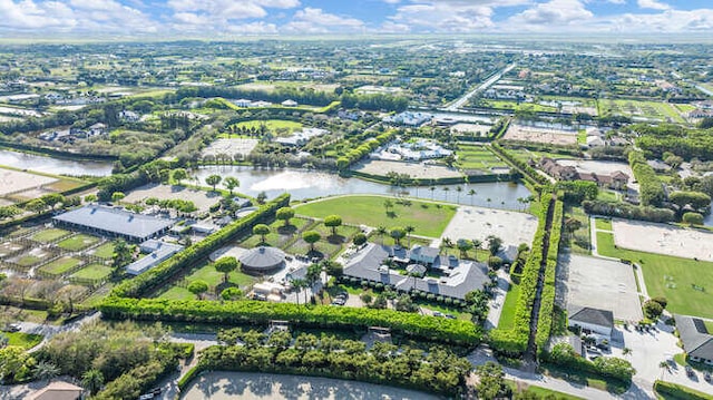 bird's eye view with a water view and a residential view