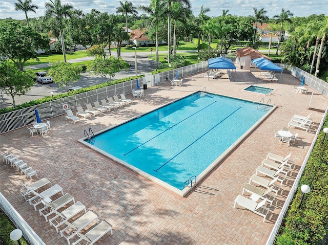 view of swimming pool featuring a patio