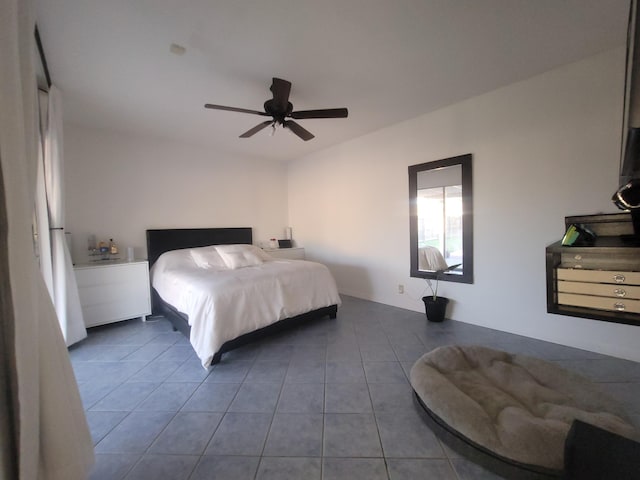 bedroom featuring tile patterned flooring and ceiling fan