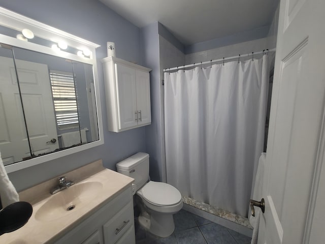 bathroom featuring tile patterned flooring, vanity, toilet, and a shower with shower curtain