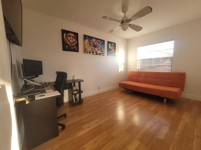 office area featuring ceiling fan and light wood-type flooring