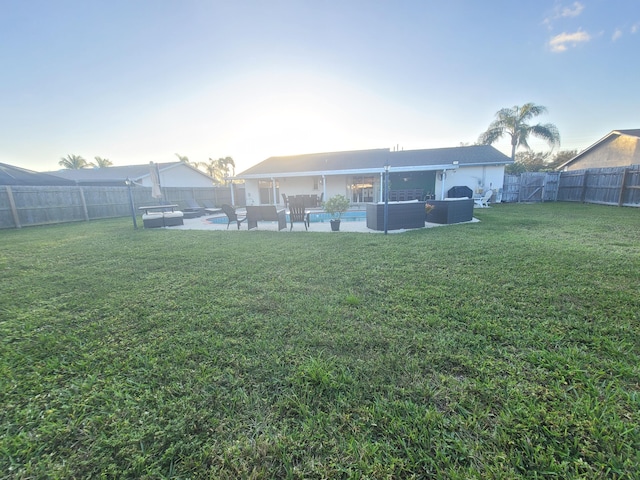 view of yard with a fenced in pool, an outdoor hangout area, and a patio area