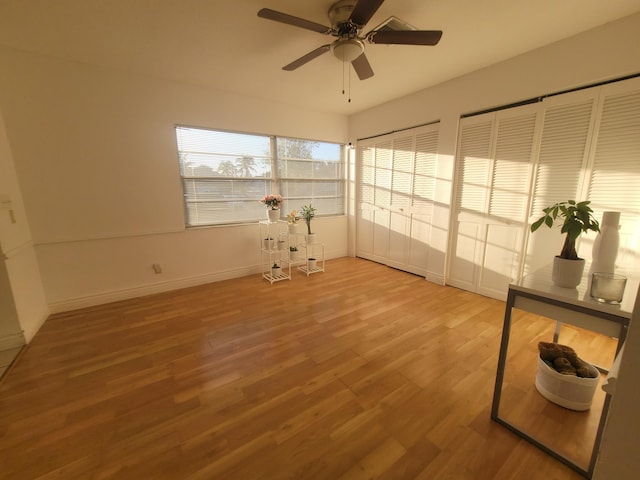 interior space featuring ceiling fan