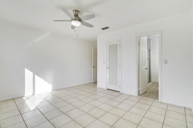 interior space featuring ceiling fan