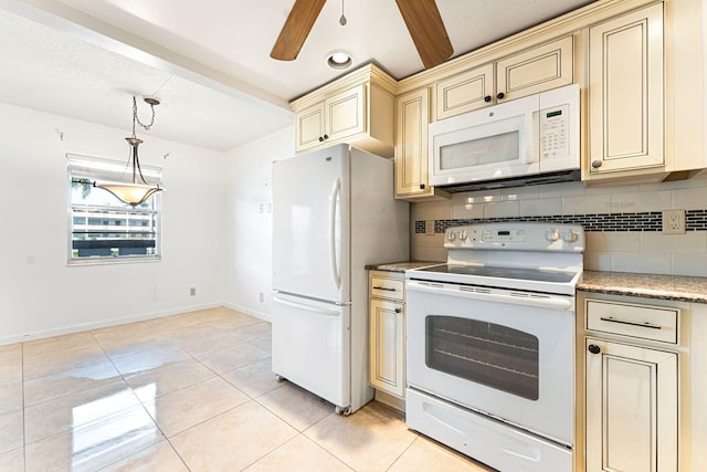 kitchen with tasteful backsplash, white appliances, cream cabinets, and pendant lighting