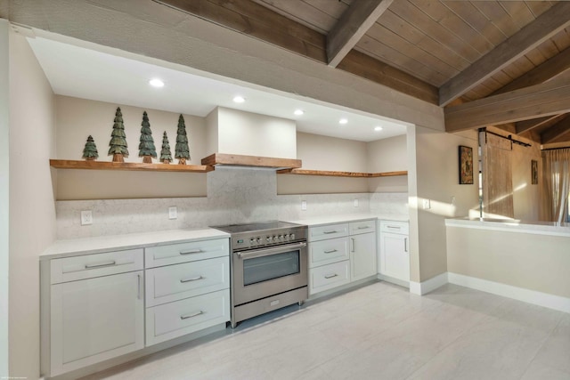 kitchen featuring backsplash, beamed ceiling, high end stainless steel range oven, and premium range hood