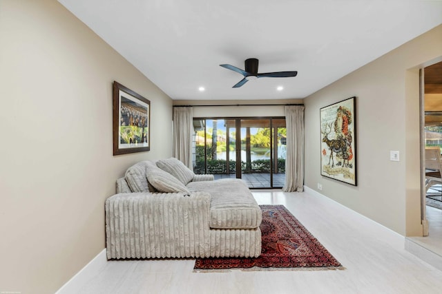 living room featuring ceiling fan