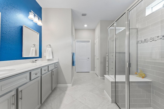 bathroom featuring walk in shower and vanity