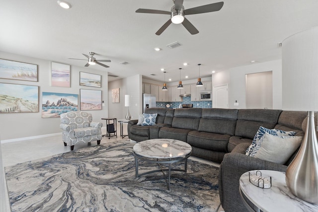 living room featuring ceiling fan