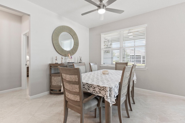 dining room with ceiling fan