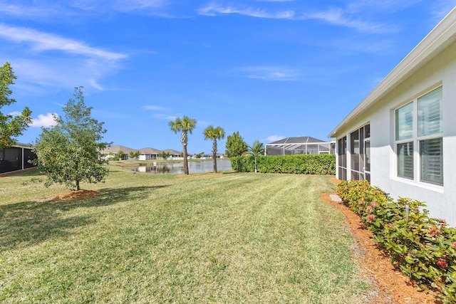 view of yard with a water view